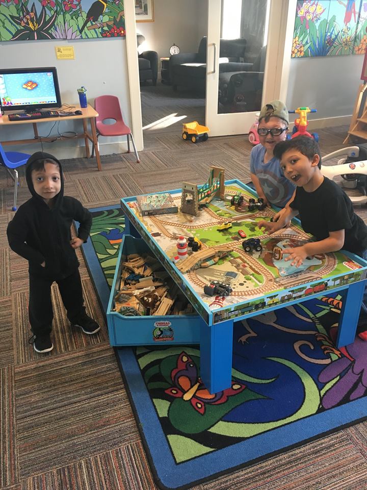 Arshaan, Jahan and Levi in the playroom at the Ronald McDonald House, Delaware